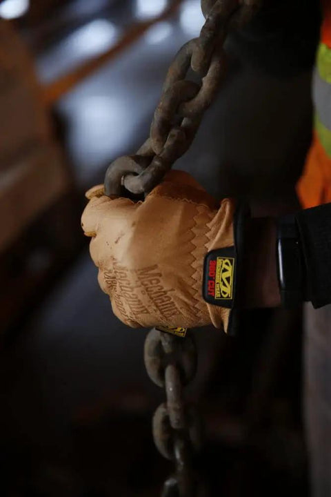 Flame And Arc Resistant Leather Driver Gloves With Durahide Leather, Water Repellent Finish, Size Large, holding a chain