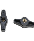 Close-up of Four Pack Quarter Twenty Thru Knobs for T Track Woodworking Jigs featuring ergonomic black design and threaded inserts.