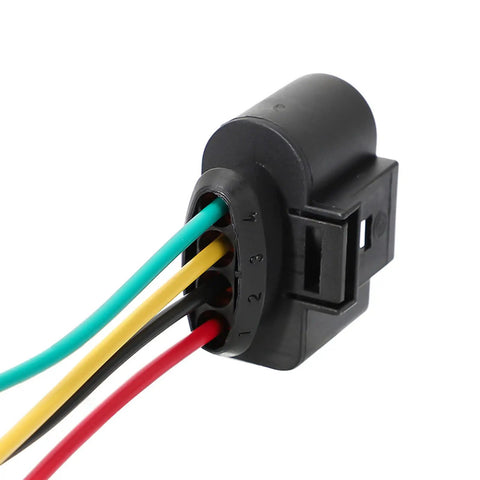 Close-up of VW Ignition Coil Harness Connector with colored wires, part of the Connector Kit 4 Pack with Heat Shrink Butt Connectors