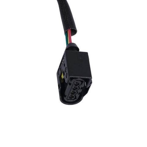 Black 6-pin automotive connector on a wiring harness with red, yellow, and green wires