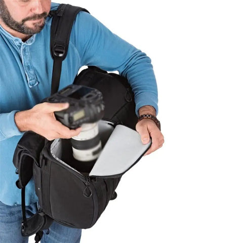 Man using Shoulder Camera Bag Backpack With All Weather Cover Fits 15.6 Inch Laptop SLR Gear Organizer Lightweight Yet Spacious