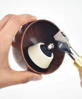 Beast Bowl Sander Kit for Woodworking with 2 Inch Hook and Loop Pad sanding wood bowl, 11.8 Inch handle visible in use.