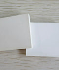 High Purity BN Ceramic Sheet For Heat Sinks And Lab Research, 10mm By 100mm By 100mm, 1 Piece on a wooden surface