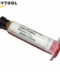 Solder Paste 10cc Flux Grease RMA223 syringe for PCB repair, labeled, black cap, angled view. For chips, computers, phones, LEDs.
