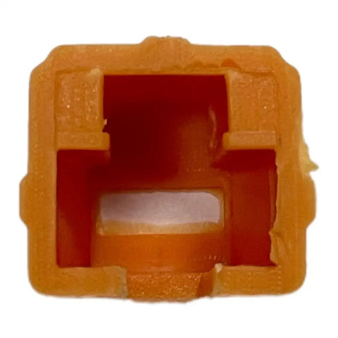 Close-up view of a heavy-duty orange nailer pad from the Crank Out Projects Faster With This Heavy Duty Replacement Nailer Pad Kit 5 Piece Tip Rebuild Set That Works Like A Champ For Smoother Nail Gun Operation And Foolproof Surface Grip On Any Daily Grind.