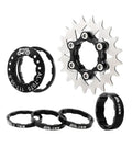 Dope Single Speed Conversion Kit 13T To 22T Cogs With 17T Cassette And Spacers Fits Shimano Or Sram 8 To 11 Speed HG Cassettes Works On Mountain And Road Bikes Spacers Included And Ready To Roll displayed with cogs and spacers layout.