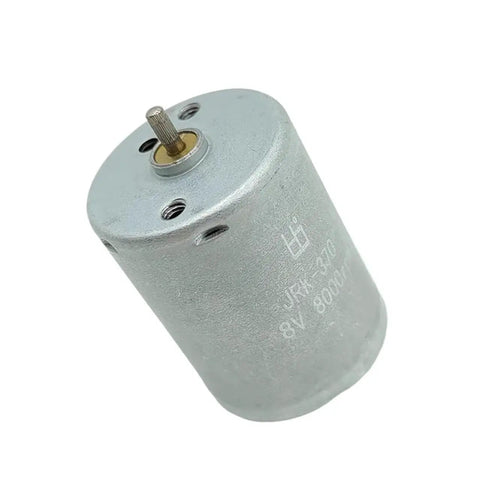 Pro Tier 24mm Electric Motor Delivering Smooth Low Noise Torque With Rock Solid Dust Resistant Housing For Continuous All Day Grind 3V To 12V Up To 12500 Rpm In Hobby Or Shop Builds, silver DC motor with exposed drive shaft.