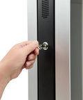 Person using a key to unlock the black front panel of the Kick Up Your Digital Vibes With This Dual Side Interactive Touch Screen Kiosk.