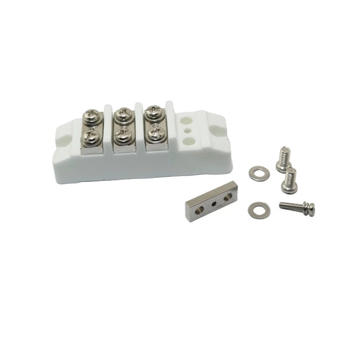 Front view of a white four-position ceramic high-current terminal block with screw terminals and mounting hardware.