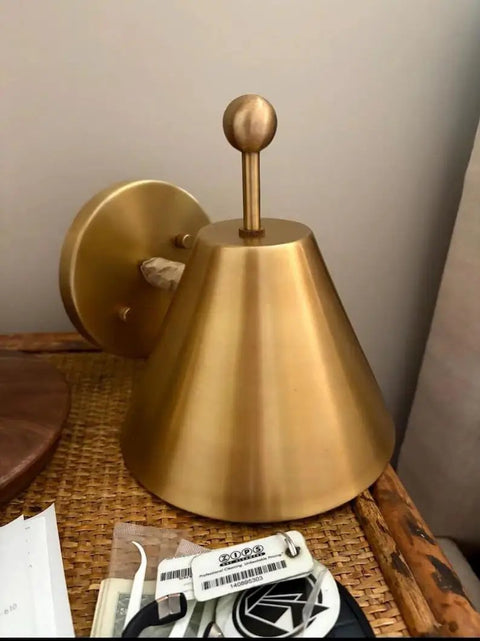 Handcrafted Brass Wall Sconce with Finial Vintage Hardwired Light showcasing elegant finial and brass cone shade.