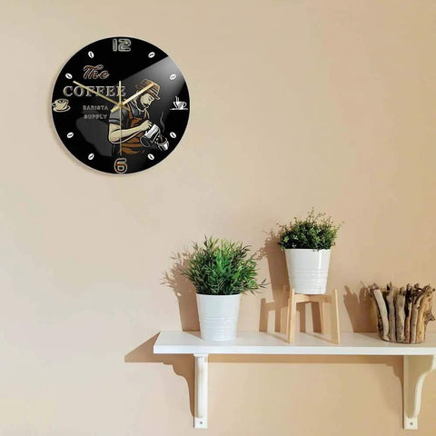 Barista Coffee Wall Clock 12 Inch Acrylic Print Battery Operated Silent Quartz Timepiece For Cafe Shop Decor Gift For Coffee Lovers Non Ticking Design on wall with plants on shelf