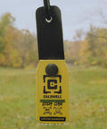 AR500 1/4 Inch Rimfire and Handgun Steel Target for Target Practice, bright yellow with hit indicators on outdoor range