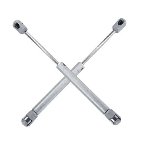 2 Pack Gas Stay Hinges For Cabinet Doors Soft Close Zinc Alloy Cupboard Hinges shown crossed on white background