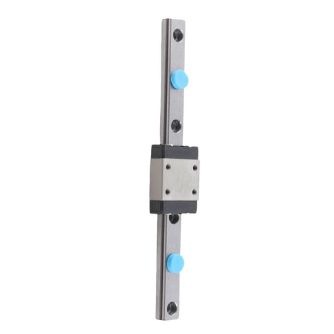 Front view of 100mm linear rail guide with sliding block on metal rail; blue knobs visible