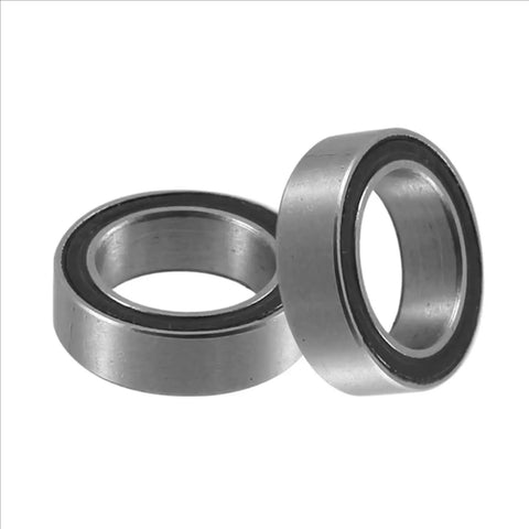 26pc Sealed Bearing Kit Upgrade Beefed Up For KRATON 8S And Outcast 1 To 5 RC Cars Pro Grade Replacement Parts Easy Install Boost Performance Durable Bearings For High Speed Runs And Tough Terrain, close-up view of two metal bearings with black seals