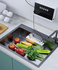 Slick Portable Sink Dishwasher And Veggie Washer Offering Automatic Hands Free Cleaning For Apartments And Camping, Reinforced Plastic, Fast Drain Layout, Total No Sweat Operation with veggies in stainless sink.
