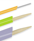 Front view of three tube turners with wooden handles, metal shafts, and colored sleeves (orange, green, purple) for sewing.