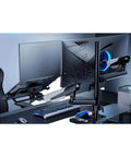Top Notch Adjustable Monitor Desk Mount Arm Stand For Single Display With Smooth Pivot Action Easy Height Adjustment And Hidden Cable Clips. View of dual display setup on sturdy desk.