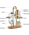 Top Shelf Belgian Siphon Coffee Maker With Clear Glass Chamber And Sleek Silver Base For No Fuss Morning Brews delivering visual details.