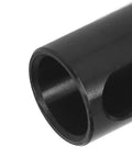 Close-up of black alloy steel CNC lathe reducer sleeve with hollow bore