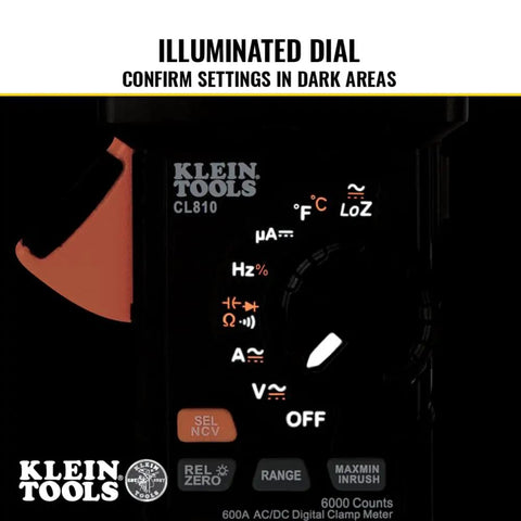 Digital Clamp Meter With True RMS And LoZ Auto Ranging illuminated dial showing settings for AC and DC voltage.