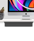 Slick Under Desk Pull Out Drawer Slide Cabinet Game Changer Gear Fits Standing And Standard Workspaces No Sweat Organization Setup Nineteen Inches Wide Thirteen Point Four Deep with monitor and plant.