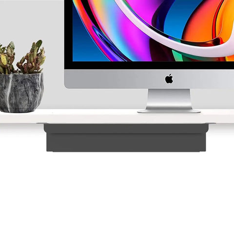 Slick Under Desk Pull Out Drawer Slide Cabinet Game Changer Gear Fits Standing And Standard Workspaces No Sweat Organization Setup Nineteen Inches Wide Thirteen Point Four Deep with monitor and plant.