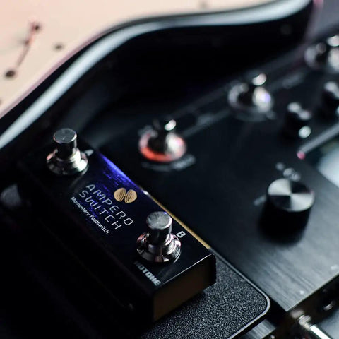 Close-up of Dual Footswitch Pedal For Guitar Effects Rig Gear Momentary 2-Way Foot Switch Controller With 6.35mm TRS Jack on pedalboard