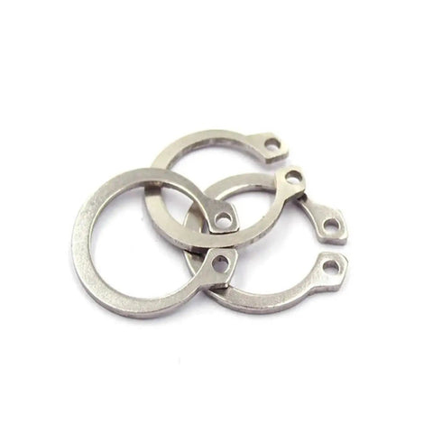Super Tough M24 External Circlips Snap Rings Pack Of 20 Stainless Steel Retaining Washers For Auto Shop Projects And Fence Builds Heavy Duty Industrial Hardware featuring three steel circlips with holes.