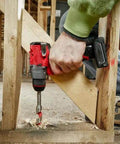 Compact 12V Cordless Drill Driver Kit With Brushless Motor And Heavy Grip Chuck Compatible With Milwaukee M12 Fuel Models drilling into wood.