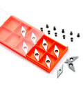 Sharp As A Tack Diamond Carbide Replacement Cutters For Wood Lathe Turning and shop detailing, ten blades with screws in an orange case.