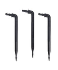 Three black six-inch angled drip emitter stakes for 1/8 to 1/4 inch tubing, part of 50 pack, for precise watering and irrigation.