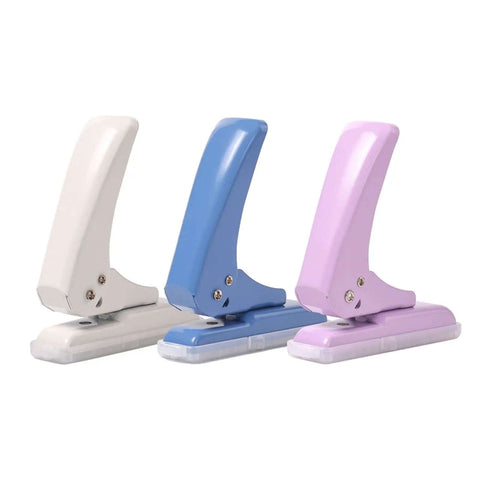 Three Pro Grade 40 Sheet Single Hole Punch With Non Slip Base in pastel colors for chipboard cards and scrapbooks, adjustable punch position.