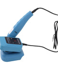 Badass Cordless Angle Grinder Featuring Six Variable Speeds Up To 18000 Rpm Plus A Rock Solid Workbench Stand And Full Accessory Kit on a blue charging base.