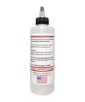 Clear 8oz Pneumatic Tool Lubricant bottle back view with usage instructions.