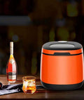Portable Countertop Ice Maker Machine Rapid Six Minute Freeze Boosts Weekend Crews With Forty Four Pounds Daily Compact Electric Ice Cube Builder Effortless Setup Vibe Friendly Design For Home Bars And Lazy Backyard Getaways Reliable on a bar counter with drink.