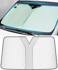 Premium Windshield Sun Shade For MG4 EV That Straight Up Slaps The Heat And Keeps Your Ride Chill While Shielding The Dash From Fading And Crack Damage On Long Highway Runs, shown on windshield.