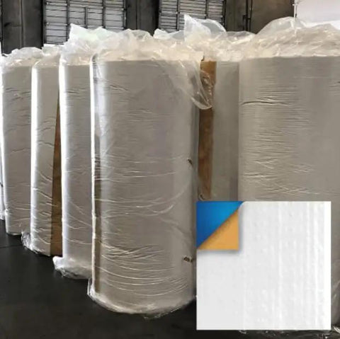 Top Shelf 2 Inch Fiberglass Insulation Roll With Psk Facing For Metal Buildings And Pole Barns stacked in warehouse, showing insulation material.