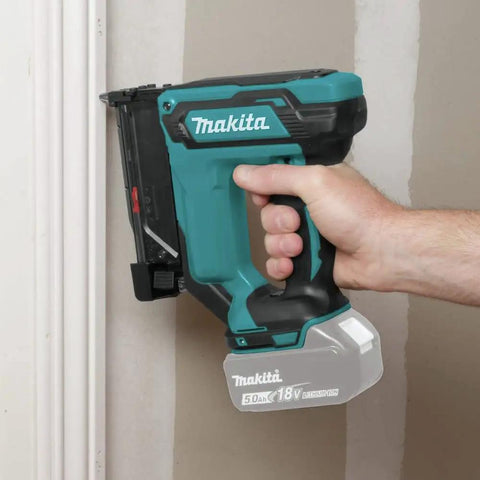 18V LXT Lithium Ion Cordless 23 Gauge Pin Nailer Tool Only Renewed with ergonomic grip, positioned for fine carpentry work.
