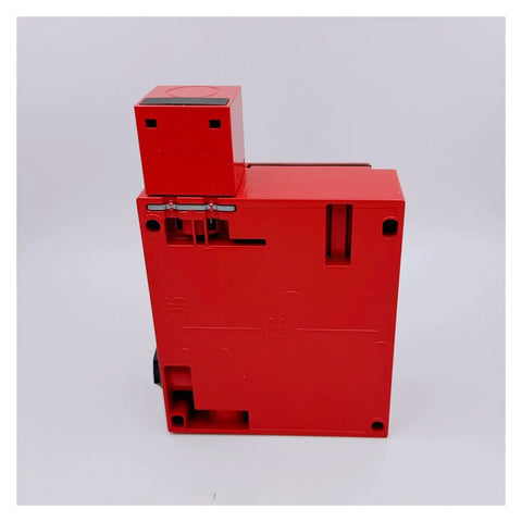 Rock Solid XCSE7512 Safety Door Switch Featuring Insert Solenoid Guard Lock, red plastic body, designed for heavy duty industrial machinery.