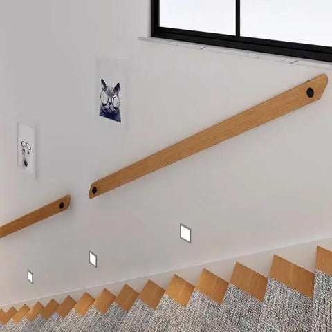 Solid Wood Wall Mounted Handrail With Anti Slip Ergonomic Grip For Indoor Outdoor Stairs And Hallways No Sweat Diy Installation Dead Steady Support Knockout Family Safety Four Foot Long Section positioned along stairs with wall decor.