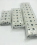 Three durable pneumatic solenoid valve base manifold 200M series with one quarter inch BSPT ports, different sizes in packaging