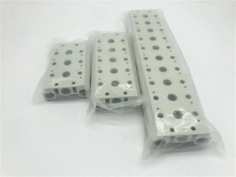 Three durable pneumatic solenoid valve base manifold 200M series with one quarter inch BSPT ports, different sizes in packaging