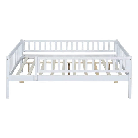 Full-Size Wood Daybed With Trundle And Fence Guardrails In White Finish shown without mattress ready frame
