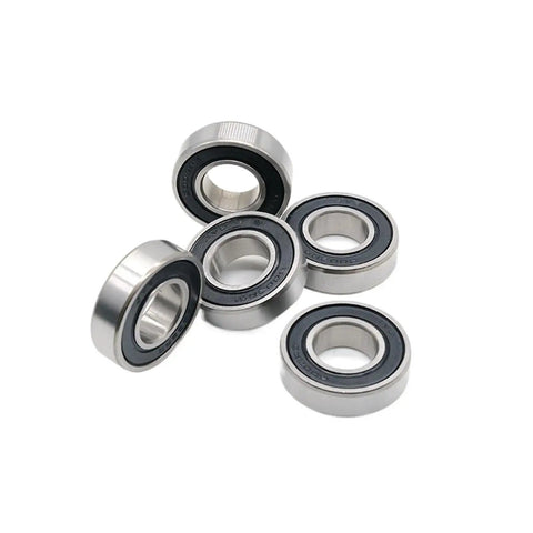 Top Notch Double Sealed Deep Groove Ball Bearings 6004RS Set Of 2 arranged, showcasing ABEC 7 precision and 20x42x12mm size.