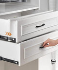 Soft Close Cabinet Drawer Slides With 3 Fold Full Extension, Side Mount Track Glides, shown on white cabinet, hand pulling drawer open