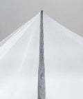 Close-up of the top corner of the Mosquito Net Bed Canopy With Princess Lace, White Four Corner Support, elegant mesh fabric.