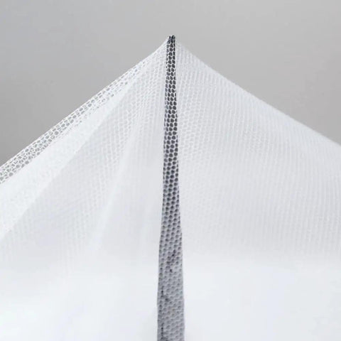 Close-up of the top corner of the Mosquito Net Bed Canopy With Princess Lace, White Four Corner Support, elegant mesh fabric.