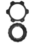 Center Lock Adapter For Bikes Lightweight Aluminum Disc Brake Rotor Upgrade, black centerlock to 6 bolt adapter shown flat.