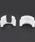 Two white components of Gear Selector Shift Lever Bush Repair Kit For Vito Viano W639 Replacement X8R0172, shown on a black background.